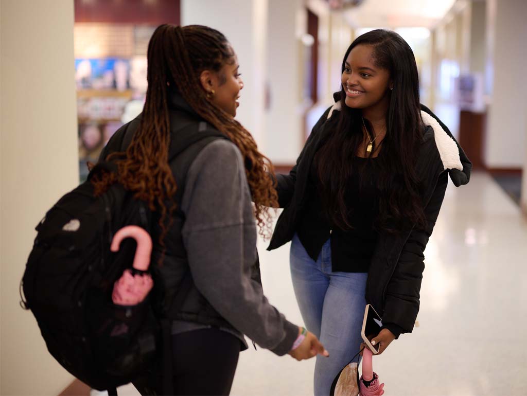 Students talking in hallway