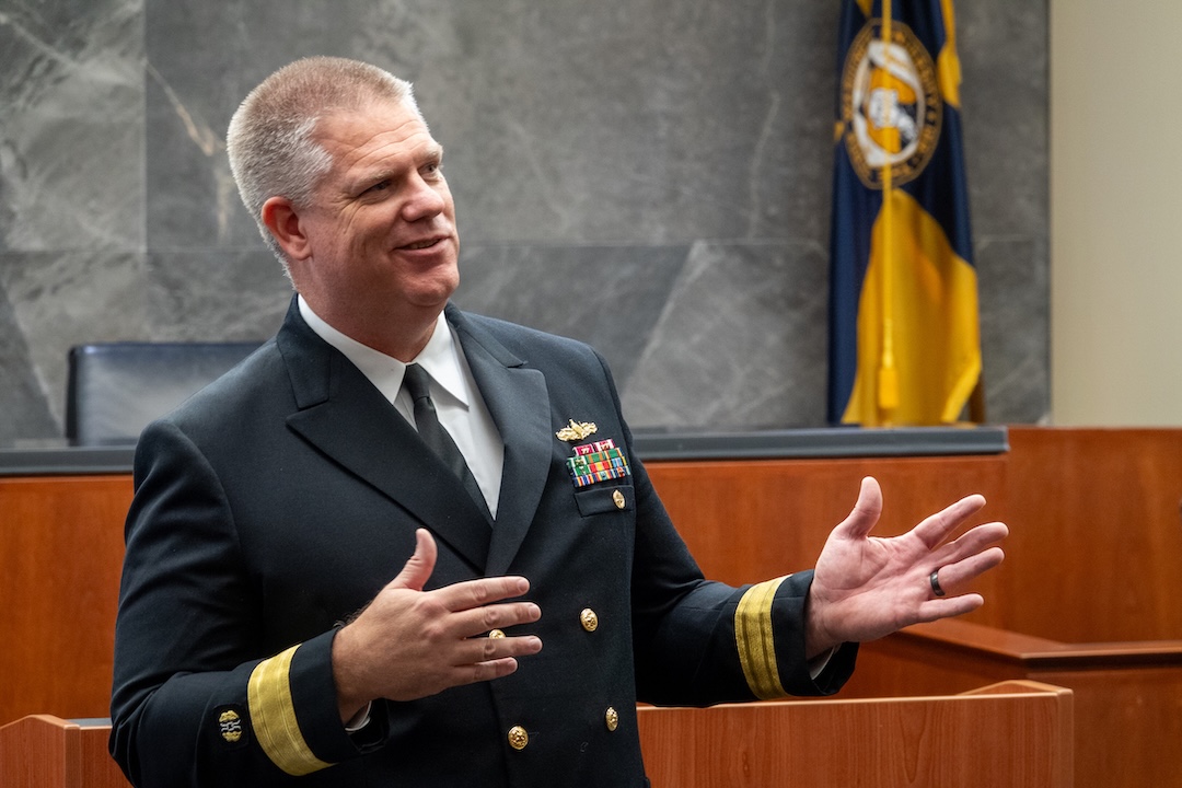 Admiral Stevens speaking at a National Security, Cybersecurity, & Foreign Relations event